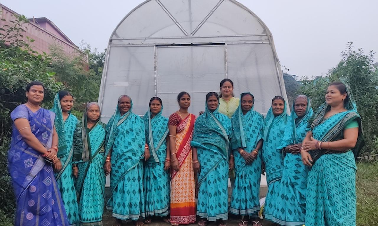 Neetha Shenoy (in light green) posing with the Women Self-Help Group of Jagatsingpur district, Odisha involved in hygienic dried fish production using a solar dryer. Photo by Sourabh Kumar Dubey. 