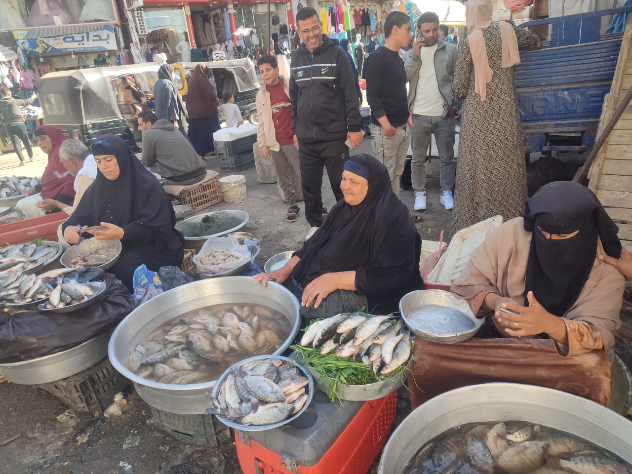 A group of women fish vendors seliing fish at a local market in Shakshouk village, Fayoum, Egypt. Photo by Photo by Mahmoud Rashad, research assistant, WorldFish – Egypt. 