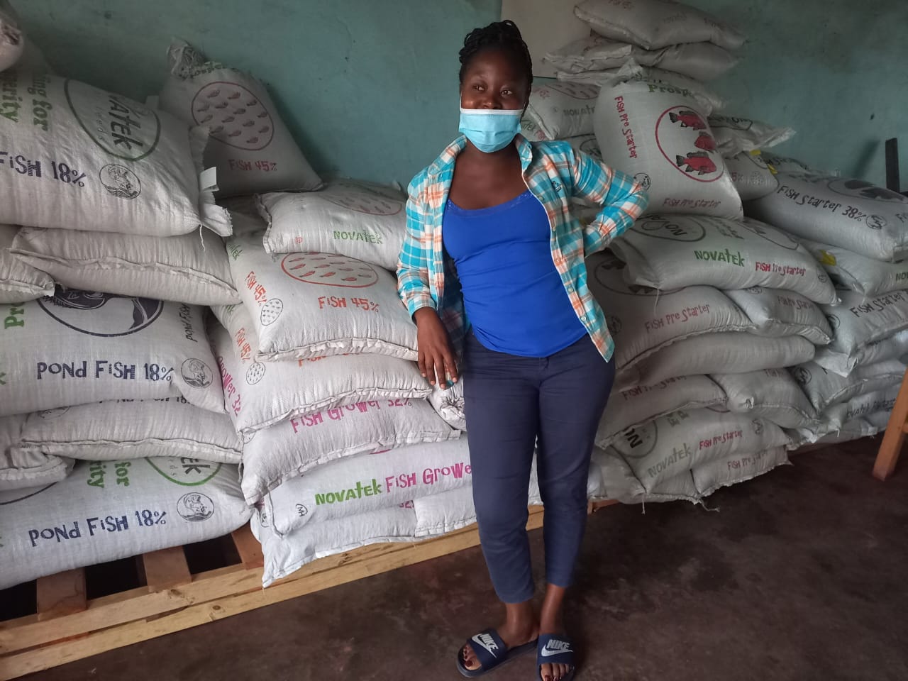 Mfune Mwendalubi, a first-time fish feed seller, now has a busy shop in Mporokoso district. Photo: Mercy Sichone