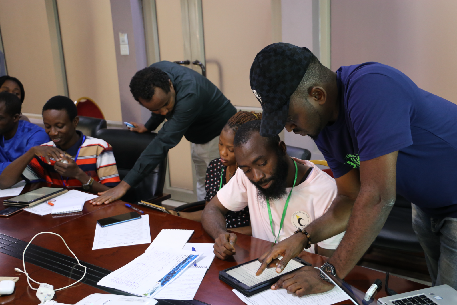 Enumerators undergoing training by the AABS team members  