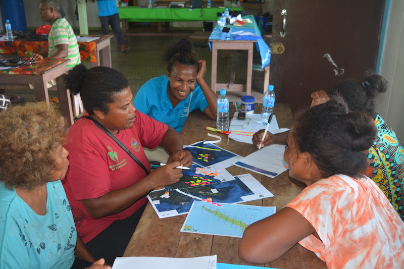 Faye Aborina Siota (middle in blue) hopes she will not only help provincial fisheries officers gain capability but will also spotlight them as lead fisheries agents in each province through her research. Photo by Wilson Eta.