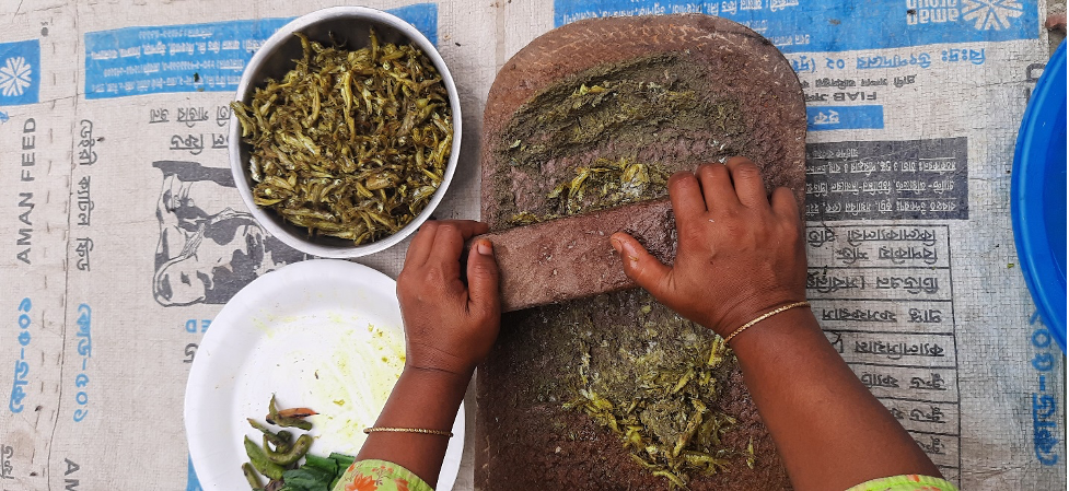 Fish, including its head and eyes, are mashed before putting in the khichuri. Photo by WorldFish/Maherin Ahmed 