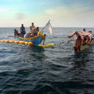 Local fishers in Timor Leste check a fish aggregating device moments after heavy concrete anchors have been dropped to a depth of 300m Photo by Dave Mills/WorldFish. 