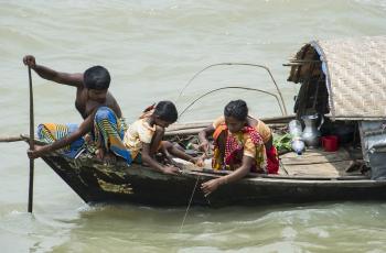 A family fishes in Chandpur, Bangladesh. Photo by Finn Thilsted.