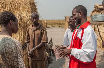 Nicholas Kapi Ndabulula, fish trader, Barotse floodplain, Zambia. Photo by Clayton Smith.