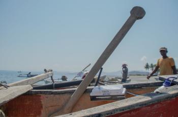 Joctan Lopes teaching young graduates how to install the Pelagic Data Systems (PDS) trackers onto small-scale fisher boats in Timor-Leste. Photo supplied by Joctan Lopes.