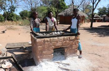 Women show fish drying method. Photo by Agness Chileya.