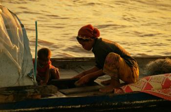 Woman in small-scale fisheries, Cambodia, photo by Jamie Oliver.