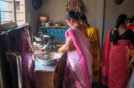 Preparing mola, a small, nutrient-rich fish, for cooking, a traditional and important source of vitamins and minerals in local diets in Assam. Photo by WorldFish.