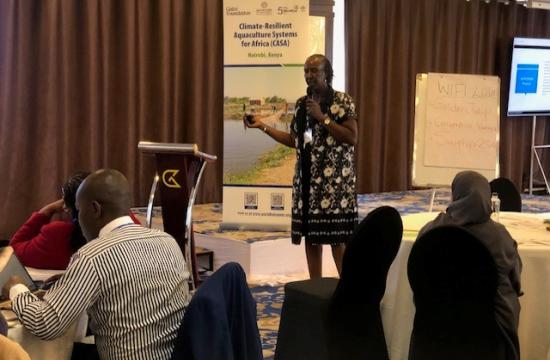 Suzanne Kuria of AWFISHNET explaining their approach to capacity building and market access for women