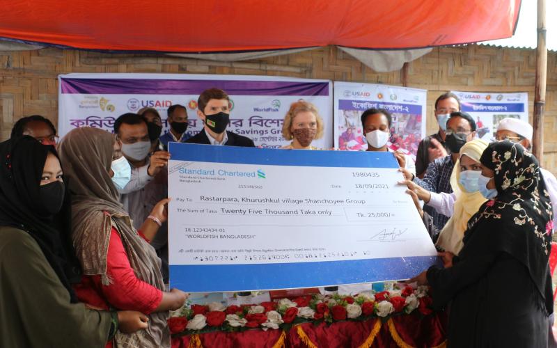 Community savings groups (CSG) receive matching grants. Photo by Md. Asaduzzaman