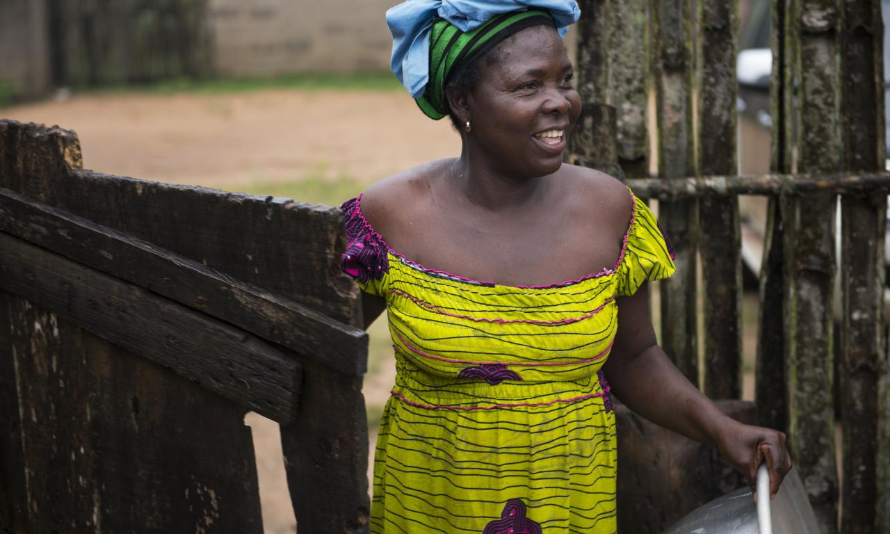 Bertha Kporvi (interviewee) at her home in Anlo Beach village, Ghana. Photo by Anna Fawcus.