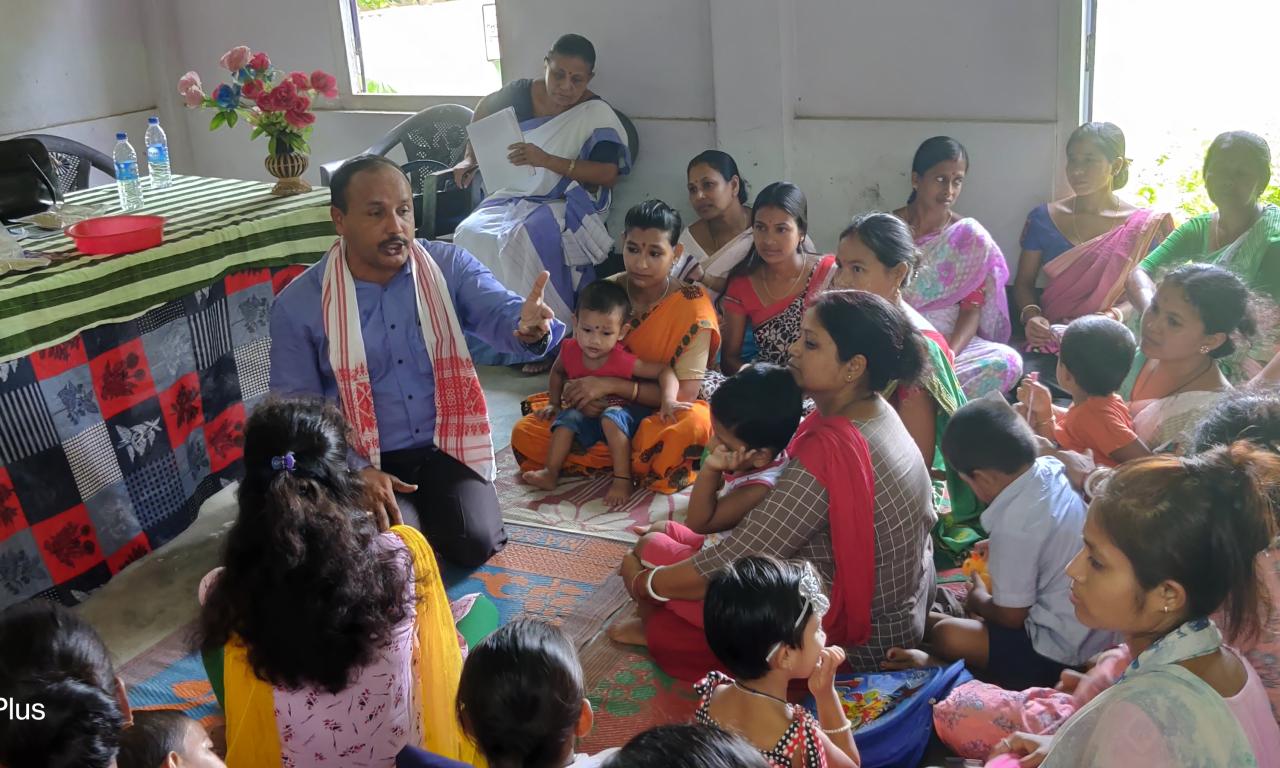 Participants learn about the nutritional benefits of small fish and how simple household practices can improve family diets during a community event in Assam.