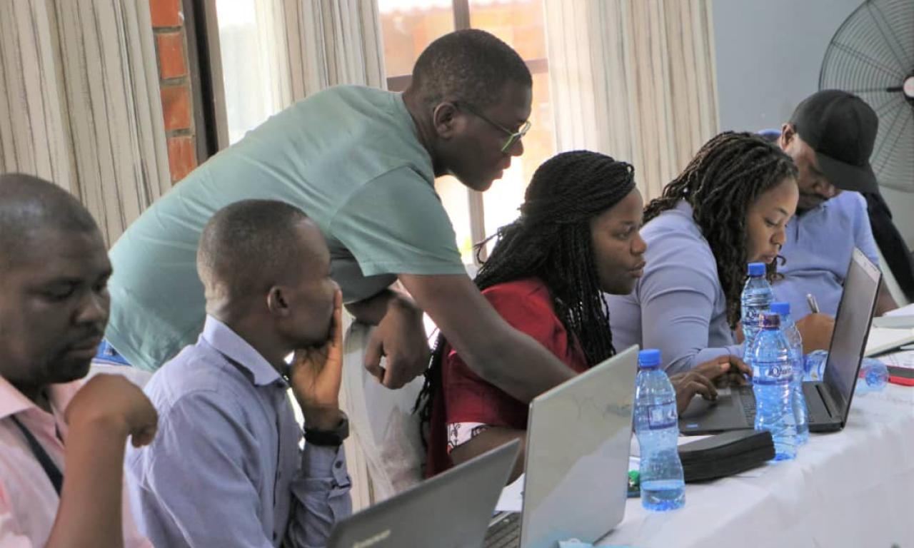 DR. Robert displaying genetic analysis to training participants