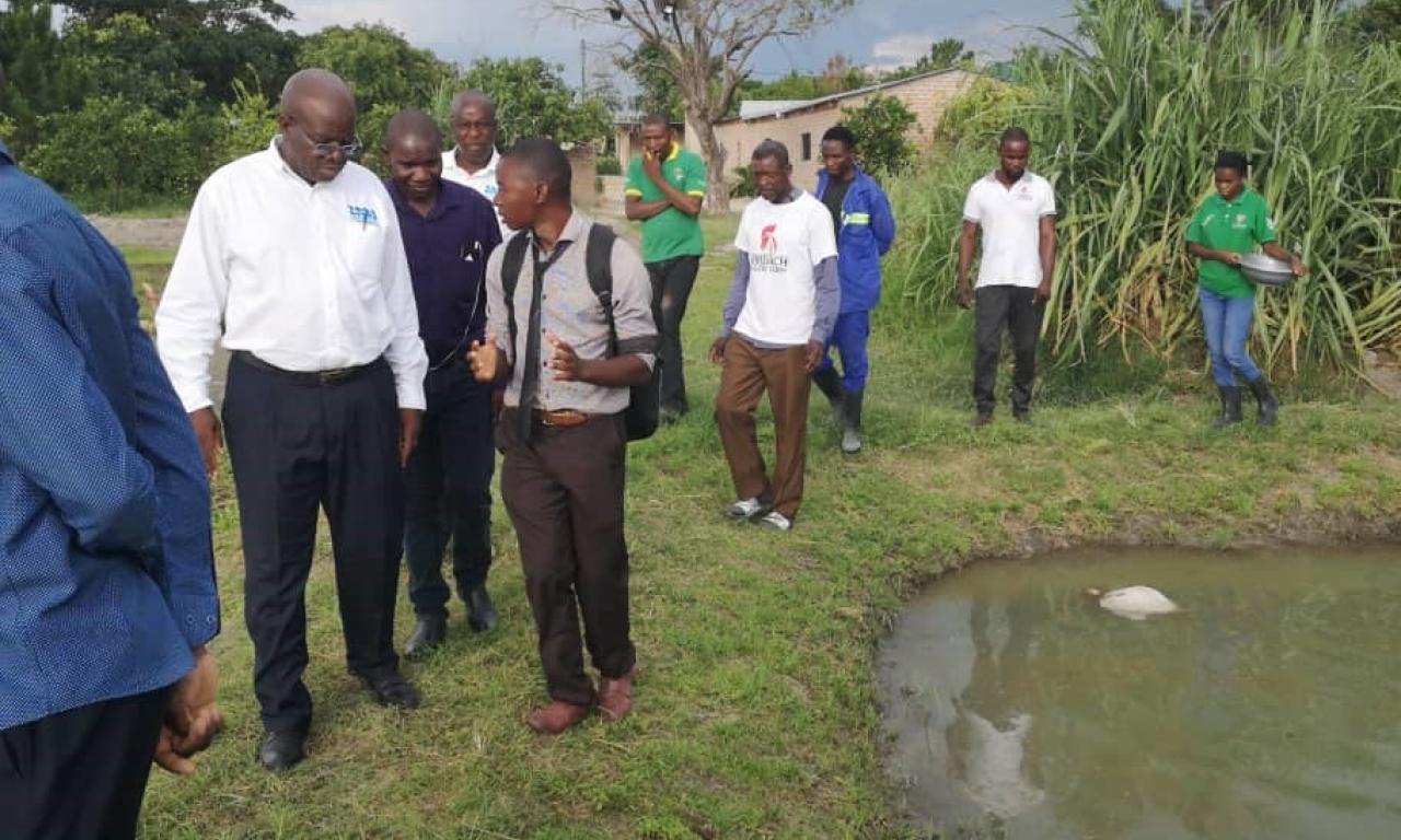 Intern Francis Banda speaks to the Zambia Bureau of Standards about farm certification.