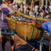 Two baskets filled with freshly caught Indian Salmon fish being carried to a fish market in Cox’s Bazar, Bangladesh, where they will be sold for local and international distribution. Photo by Philipo Ngonyani.