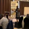 Suzanne Kuria of AWFISHNET explaining their approach to capacity building and market access for women