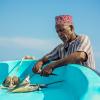 Photos of fishers, fish processors, and fish sellers captured from Jimbo beach in Kwale County, Southern Coast of Kenya. Photo by WorldFish.